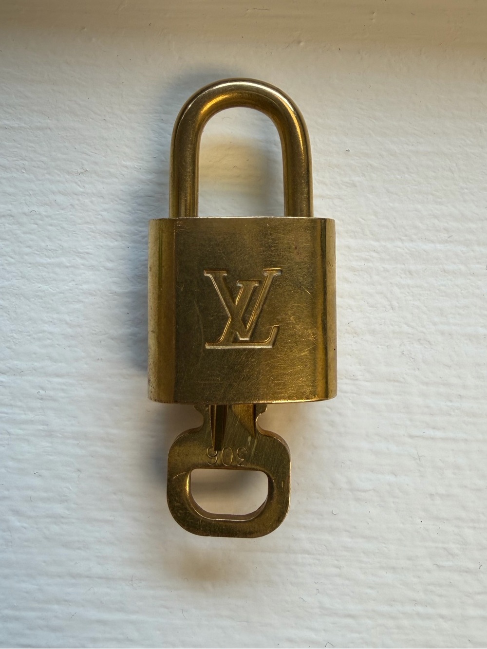 Louis Vuitton Gold Padlock and Key Set - Men's Accessory